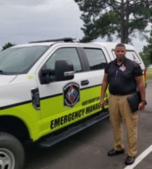 Tony Burnette with Emergency Management Vehicle